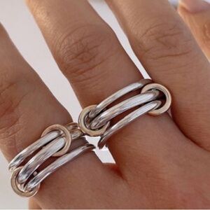 Elegant Silver and Gold Interlinked Rings